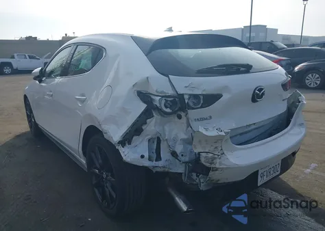 2021 Mazda Mazda3 Premium from USA, damaged, VIN JM1BPAML2M1402973